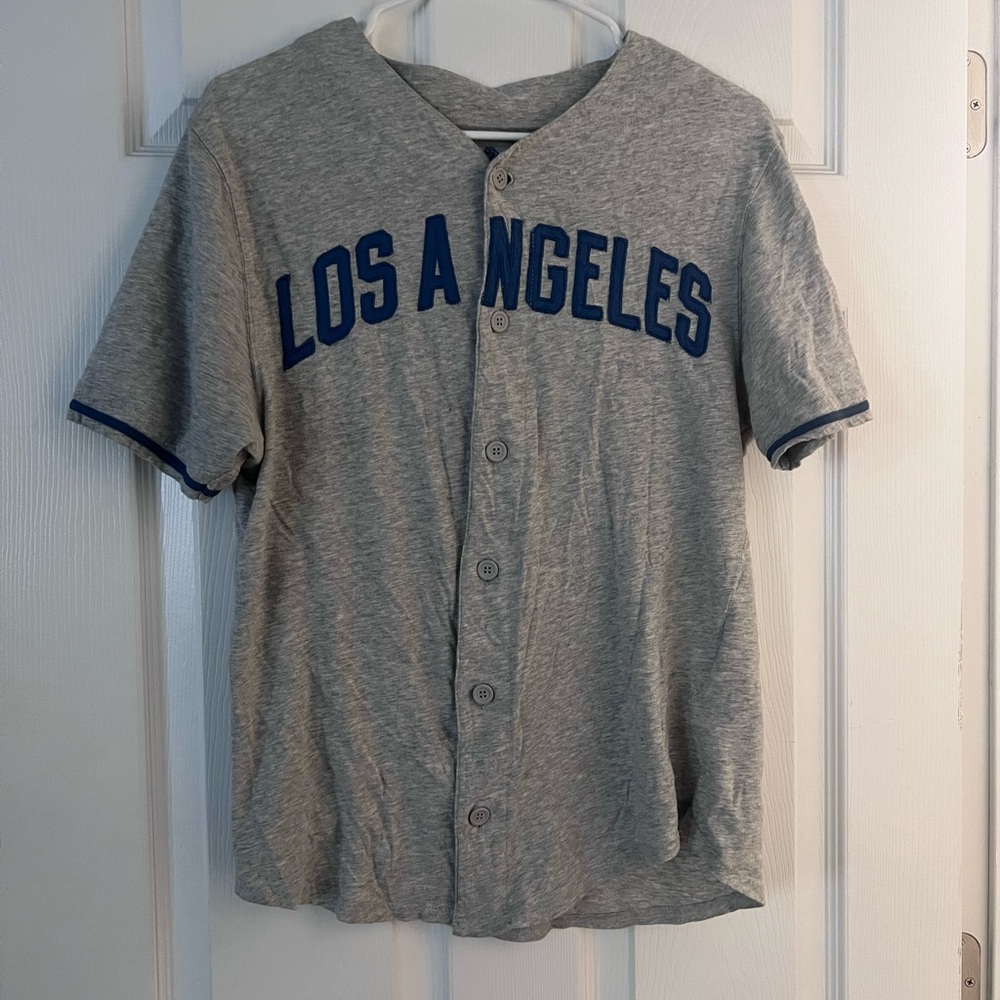 Red Jacket Gray T-Shirt with Blue Logo